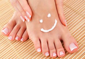 smile lotion on clean feet and beautiful hands